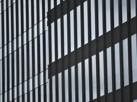 Modern skyscraper steel and glass facade in Dublin, Ireland.