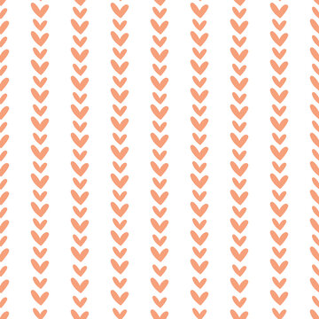 A cute Scandinavian seamless pattern with hearts. A boho-style vector background for a nursery, children's fabric, or baby textiles.