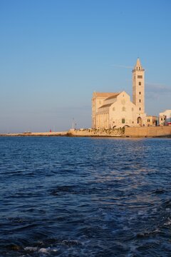 Trani town in Italy. Apulia region of Southern Italy. Cathedral of Trani - Basilica cattedrale di Maria Santissima Assunta, viewed from the sea.