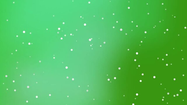 Falling white particles floating on a vibrant green gradient background