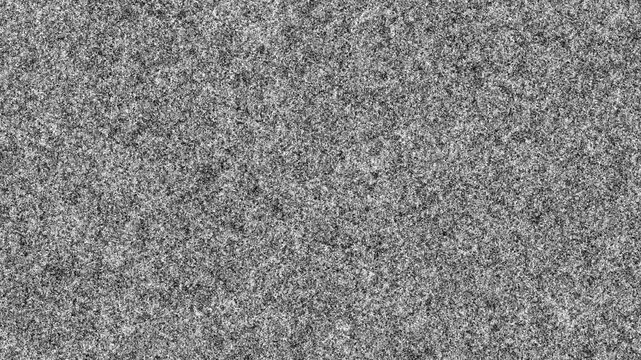 monochromatic grainy texture overlay with subtle film noise, static like background for retro video effects