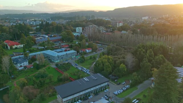Aerial view of the Austral University of Chile campus on Teja Island in Valdivia, Chile, at dawn
