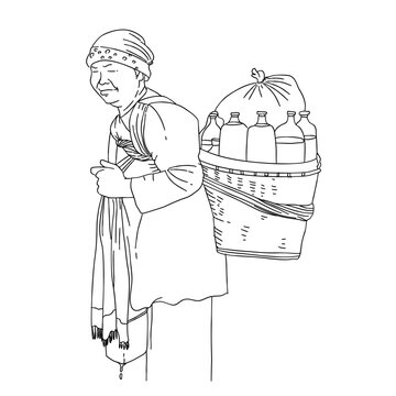 woman selling herbal medicine carried on her back. Healthy traditional drink from Java island Indonesia