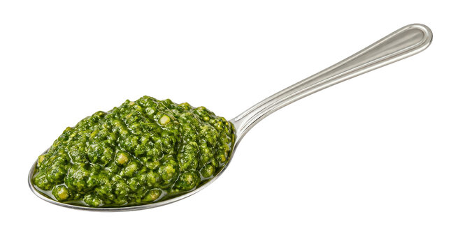 Pesto Sauce on a Silver Spoon Isolated on White Background