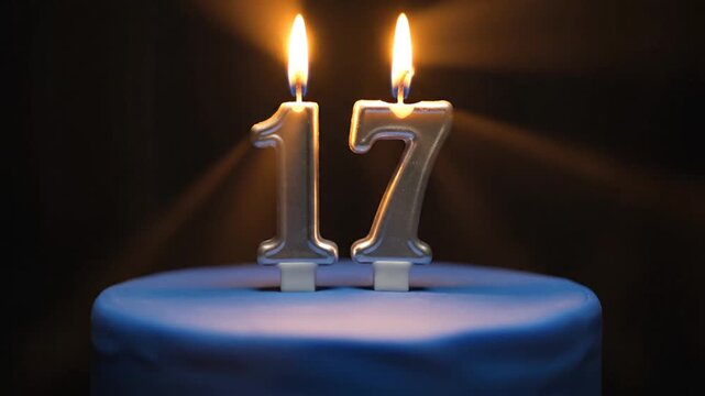 Celebratory Birthday Cake with Lit Candles in Dimly Lit Room