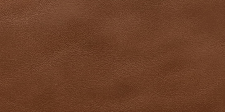 A close-up shot showcases the rich texture and subtle grain of a brown leather surface, evoking a sense of natural luxury and craftsmanship.