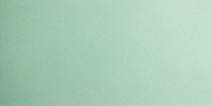 A soft, textured surface in a soothing pastel green hue, subtly illuminated with a gentle gradient from top to bottom, creating a serene and calming visual.