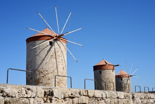 Traditional windmills at the Harbour of Rhodes, Greece