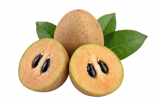 Whole and Halved Fresh Sapodilla Fruit with Green Leaves