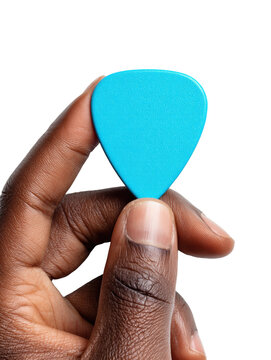 Close up of dark skinned hand holding blue guitar pick isolated on transparent background
