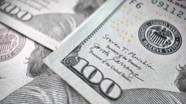 Stacking us dollar bills macro close up cash money accumulation finance wealth investment concept
