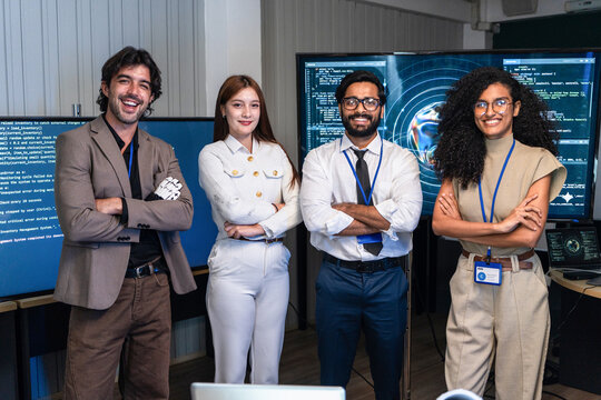 Confident developer group stand arm cross and smile after success AI software project review. Tech engineer team portrait during digital intelligence network system briefing in laboratory