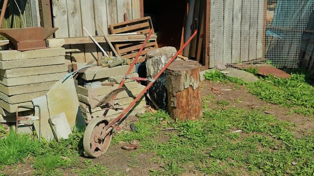 Historic farming implements and weathered materials reflect rural heritage