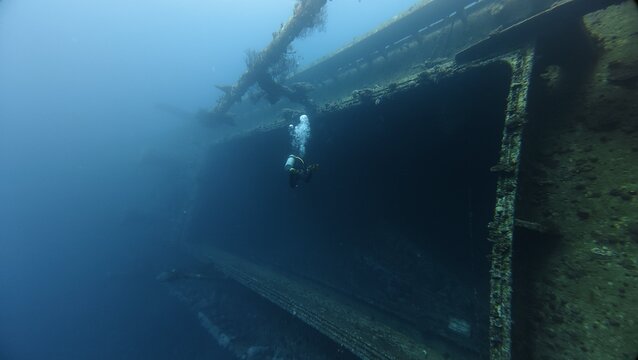 scuba diver in the deep blue