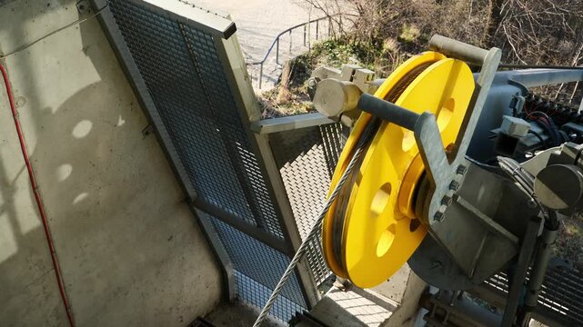 Static shot of the Pulley of a cable car turning in slow motion x0,5. Cable car to Kamienna G&oacute;ra, Gdynia, Poland.