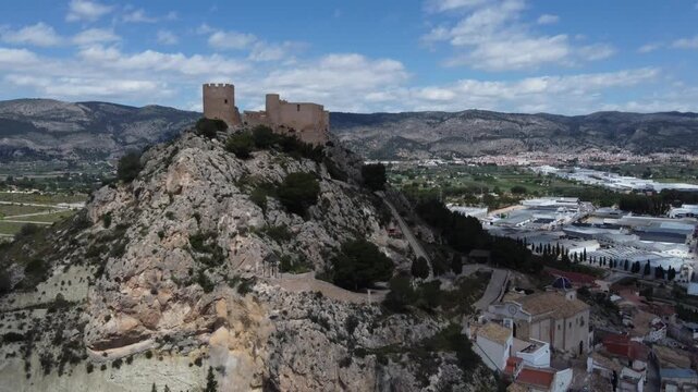 Aerial reveal of the old town and castle of Castalla, Spain.