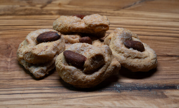 Soft cookies with a whole almond on top.