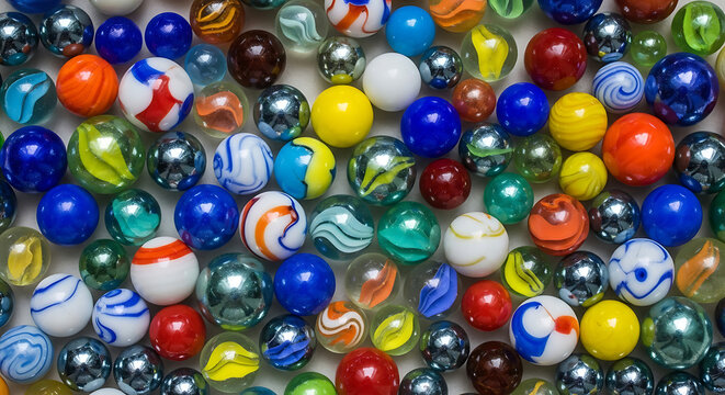 Assorted colorful glass marbles scattered texture with colorful background collection childhood assorted glassware