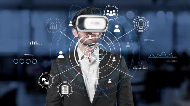 Businessman Wearing Virtual Reality Headset with Graphs and Digital Icons Representing Technology and Data Analysis in Modern Office Environment. Entropy.