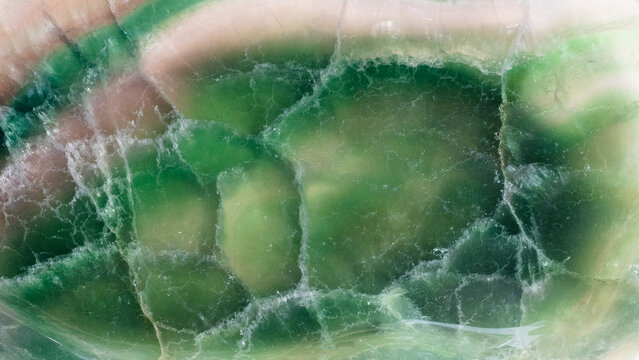 surface of polished green fluorite rock close-up