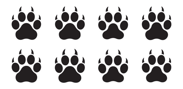 Set of eight dark animal paw print icons with sharp claws isolated on a simple transparent backdrop.