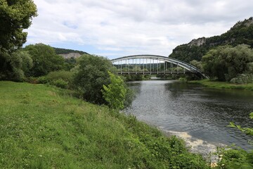 Fototapeta premium Pont de Baume les Dames sur la rivière le Doubs, ville de Baume les Dames, département du Doubs, France