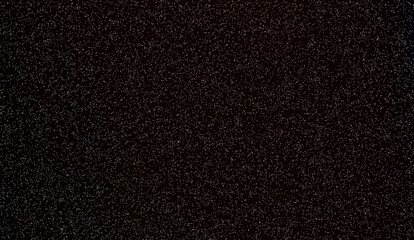 Fototapeta premium Black background with small white specks isolated