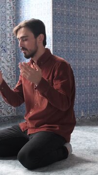 Young Man Praying In Mosque