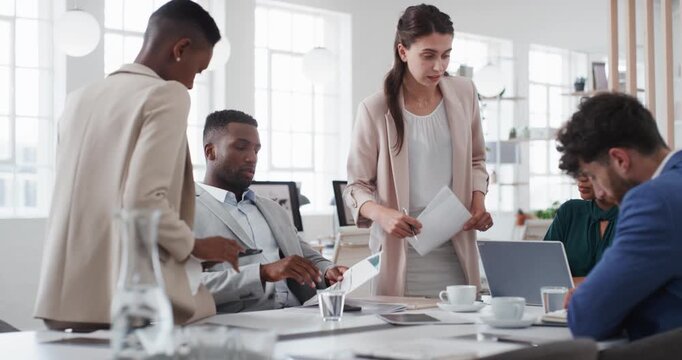 Meeting, documents and business people in office for research on finance report for budget planning. Discussion, paperwork and team of financial advisors with investment proposal review in workplace.