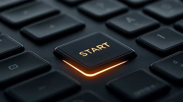 Glowing start button on a dark computer keyboard