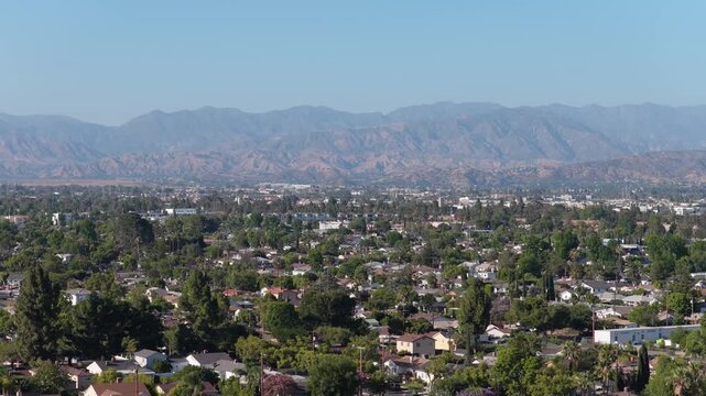 Suburban area with San Gabriel Mountains and Verdugo Mountains creating amazing urban landscapes in San Fernando Valley, Los Angeles, California