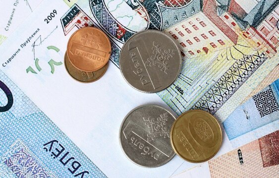 Belarusian ruble money bills and coins on table. Belarus cash of BYN currency close up
