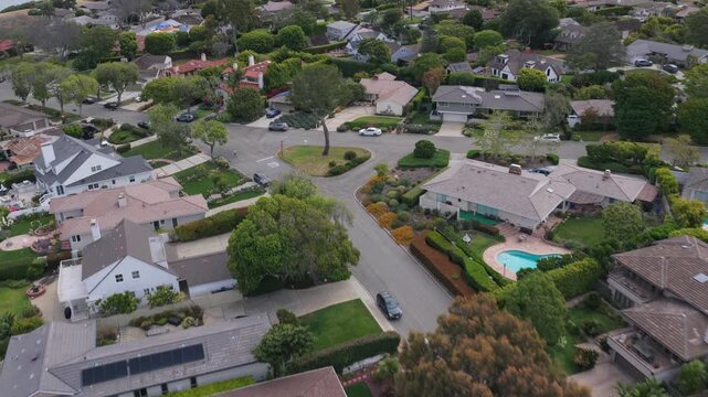 Palos Verdes Peninsula affluent houses showing coastal bluffs and residential neighborhood with tree lined streets and manicured lawns in Los Angeles County