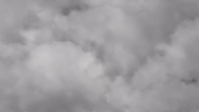 Cinematic cloud transition effect on alpha channel. Camera moves up into dense white clouds and moves down to reveal the background.