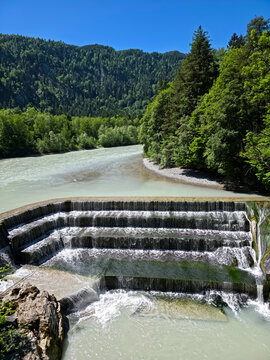germany, stunning elevated view over lechfall waterfall embraced by dense forest and radiant summer sunshine