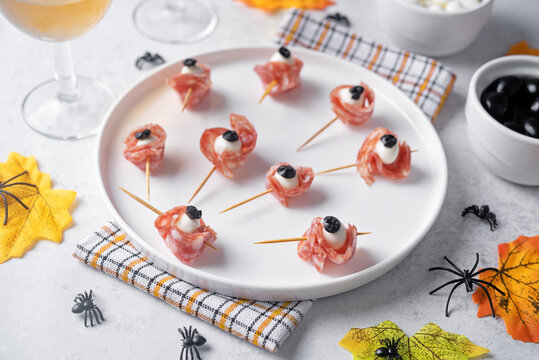 Mozzarella sausage olive canape in the form of eye for Halloween holidays