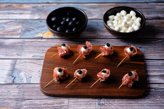 Mozzarella sausage olive canape in the form of eye for Halloween holidays