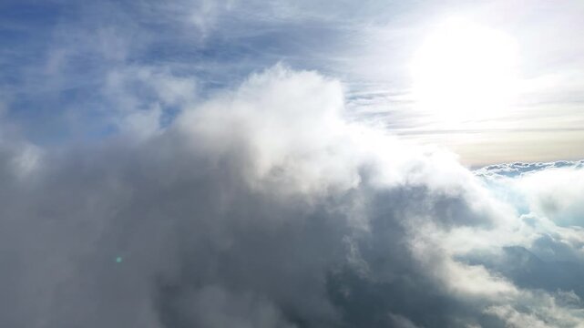 Smooth drone flight over an endless sea of white clouds.