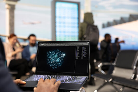Businessman working with generative AI and large language model on laptop in airport terminal, processing data through cloud computing systems.