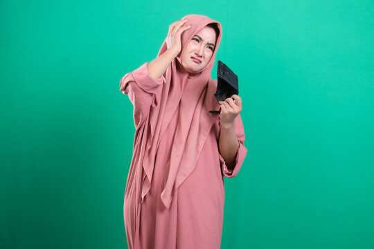 Financial distress: Young muslim woman is in despair because the