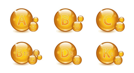 Set of golden glossy vitamin icons including A, B, C, B12, D3, and K2 on white background © HUANG