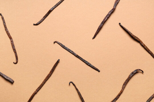 Gourmet vanilla pods on brown background