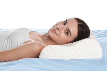 Obraz premium Woman lying on bed with orthopedic pillow against transparent background