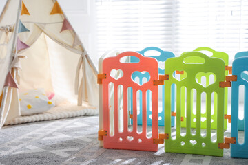 Beautiful playpen and wigwam in child's room, closeup © New Africa