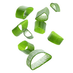 Cut green onion falling on transparent background © New Africa