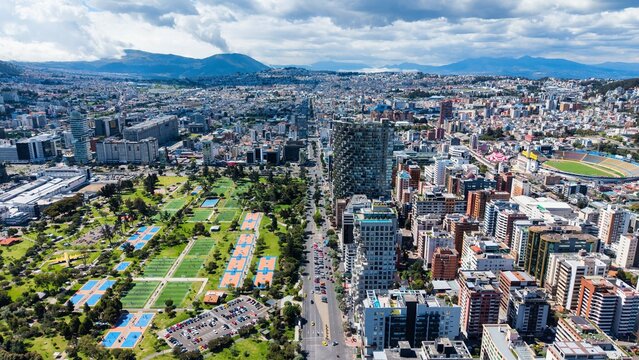 View of Quito City With Green Parks and Modern Buildings Under a Cloudy Sky in the Middle of the Day