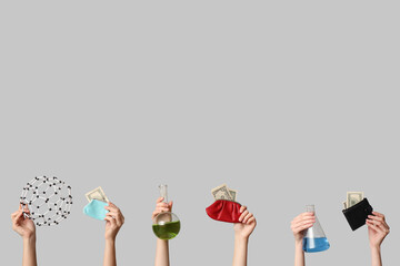 Fototapeta na wymiar Hands holding science equipment and money wallets, research funding and financial investment in scientific development, this visual concept highlights the economic support necessary for innovation