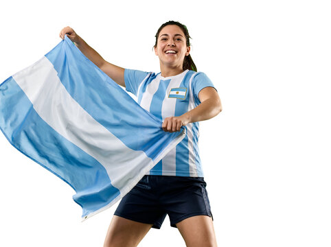 Woman proudly holding Argentinian flag and wearing football jersey. World Cup.