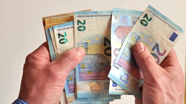 Salaries and Benefits in the European Union. Income and Expenses in EU Countries. Hands Counting Euro Banknotes. 4k footage