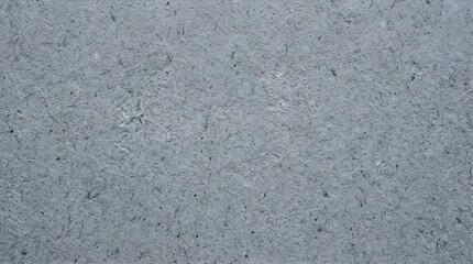 Fototapeta premium Concrete texture displays a rough grey surface with unique granular patterns.